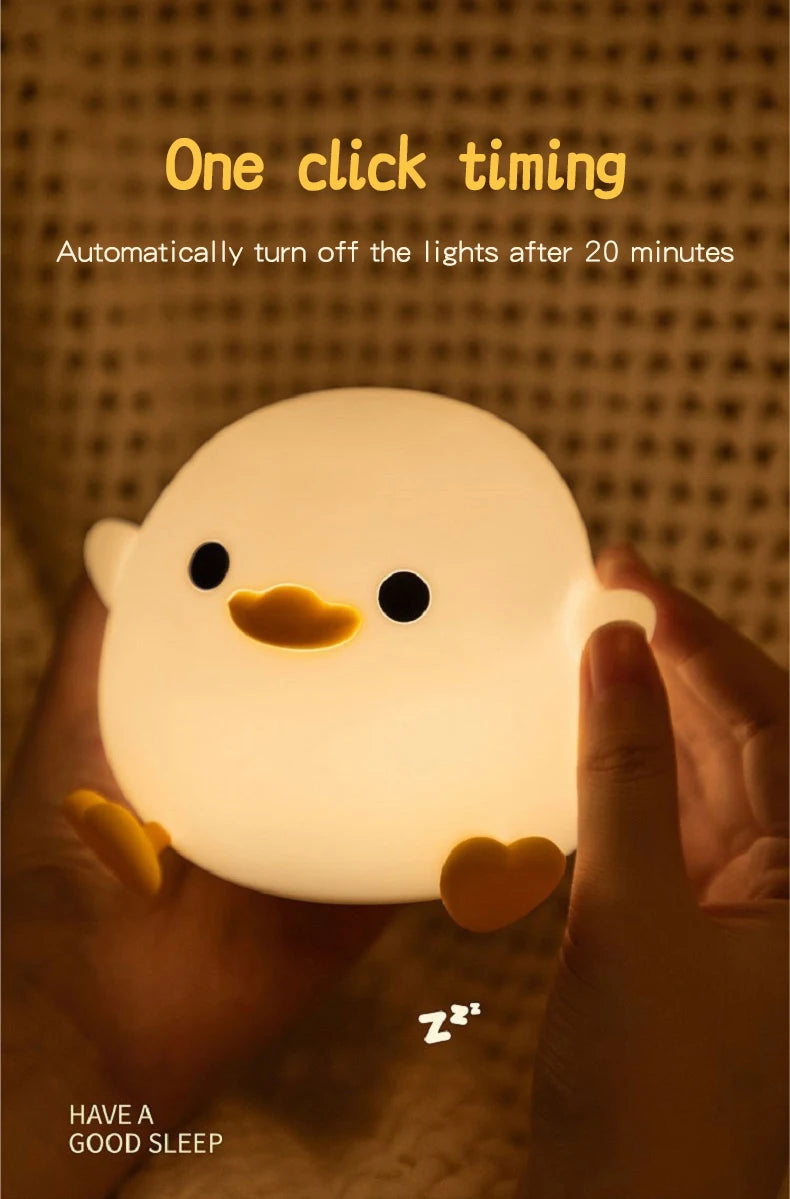 Lâmpada Doudou Duck de Silicone Luz Suave Sensor de Palmas Recarga USB