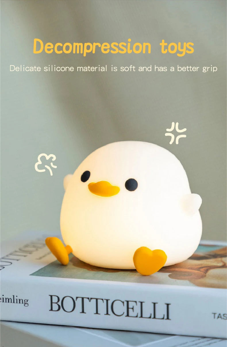 Lâmpada Doudou Duck de Silicone Luz Suave Sensor de Palmas Recarga USB